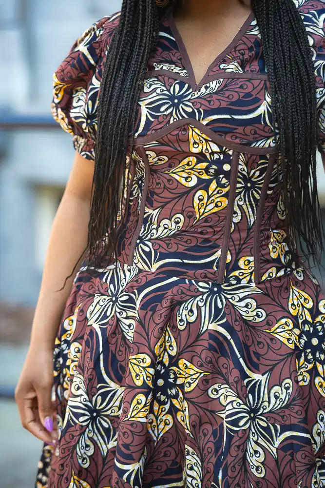 Fitted Waist Detail of African puff sleeve Ankara Dress
