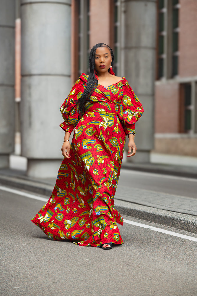 Model wearing a red and yellow Ankara Maxi Dress Women's Clothing