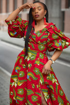 Model wearing a red and yellow Ankara Maxi Dress Women's Clothing