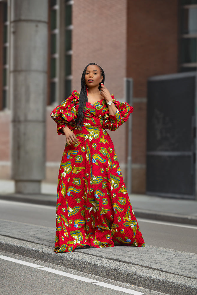 Model wearing a red and yellow Ankara Maxi Dress Women's Clothing