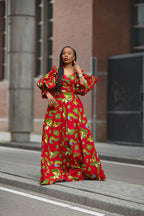 Model wearing a red and yellow Ankara Maxi Dress Women's Clothing