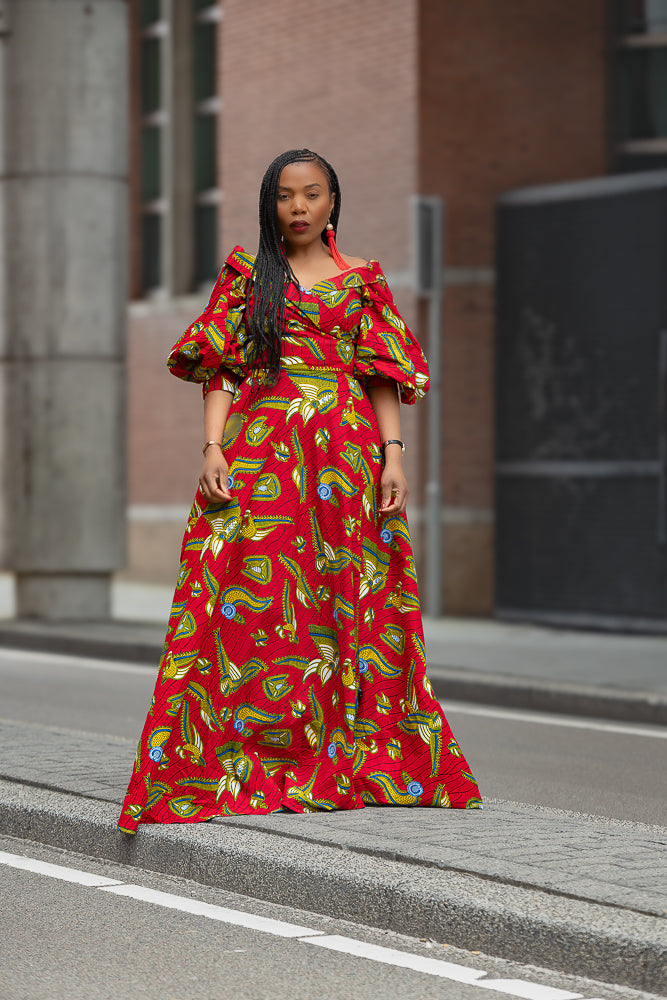 Model wearing a red and yellow Ankara Maxi Dress Women's Clothing