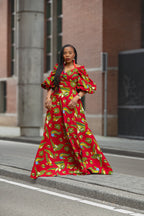 Model wearing a red and yellow Ankara Maxi Dress Women's Clothing