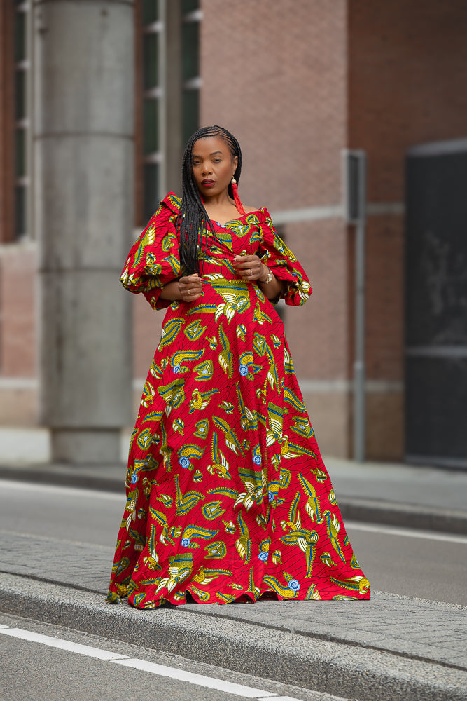 Model wearing a red and yellow Ankara Maxi Dress Women's Clothing