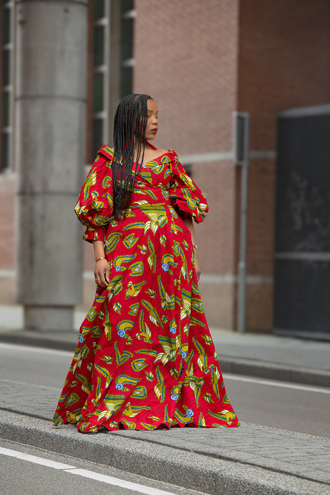 Model wearing a red and yellow Ankara Maxi Dress Women's Clothing