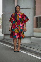 Model wearing a Floral African print Ankara Midi Dress by Heritage Clothings