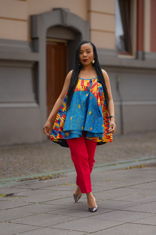 Model wearing African print Ankara sleeveless flare top outdoors