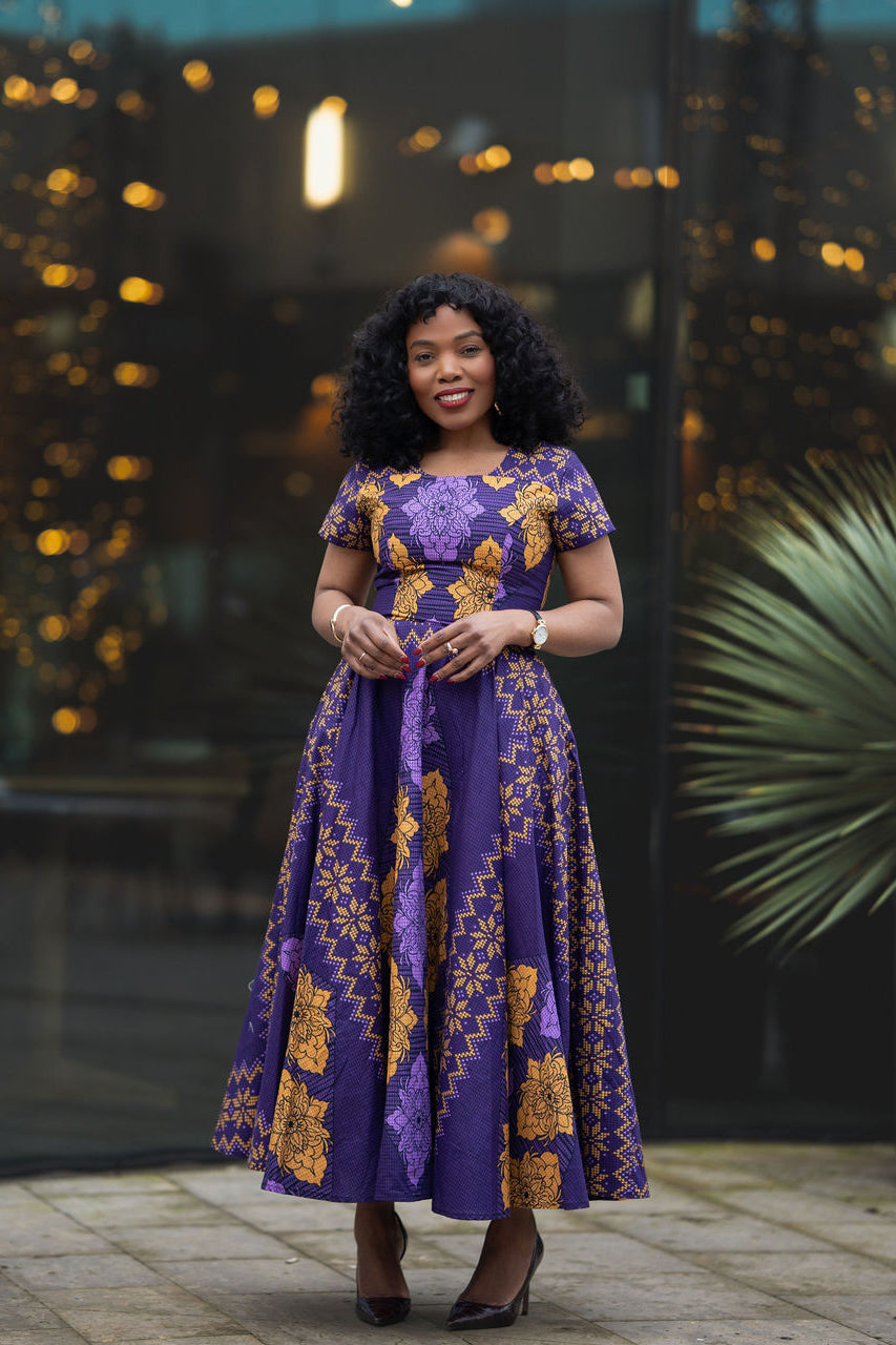 Front view of African print Ankara maxi dress in purple