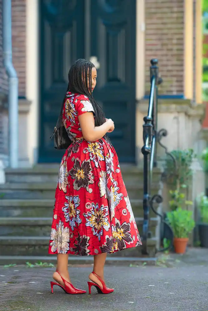 Side profile of African floral print Occasion  Midi Dress