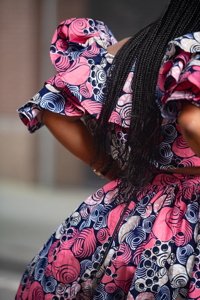 Model wearing an African print pink floral Maxi Set