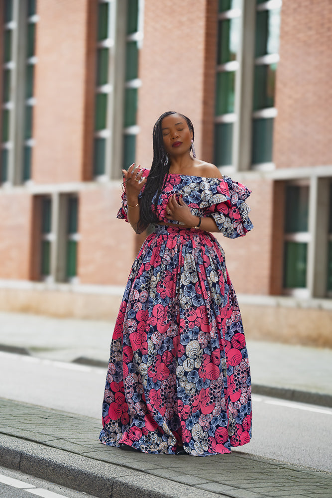 Model wearing a pink floral African print Ankara Maxi Set