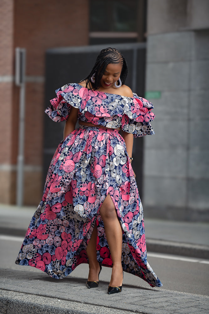 Model wearing an African print pink floral Maxi Set Women's Outfit