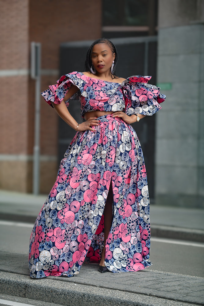 Model wearing an African print pink floral Maxi Set