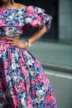 Model wearing an African print pink floral Maxi Set