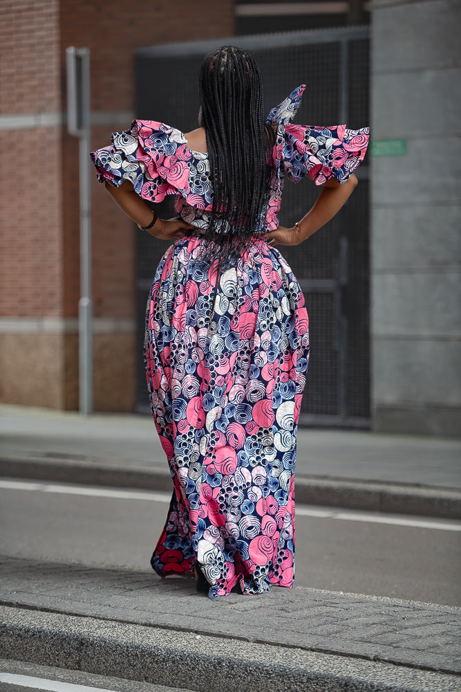 Back view of pink floral Ankara African print Dress