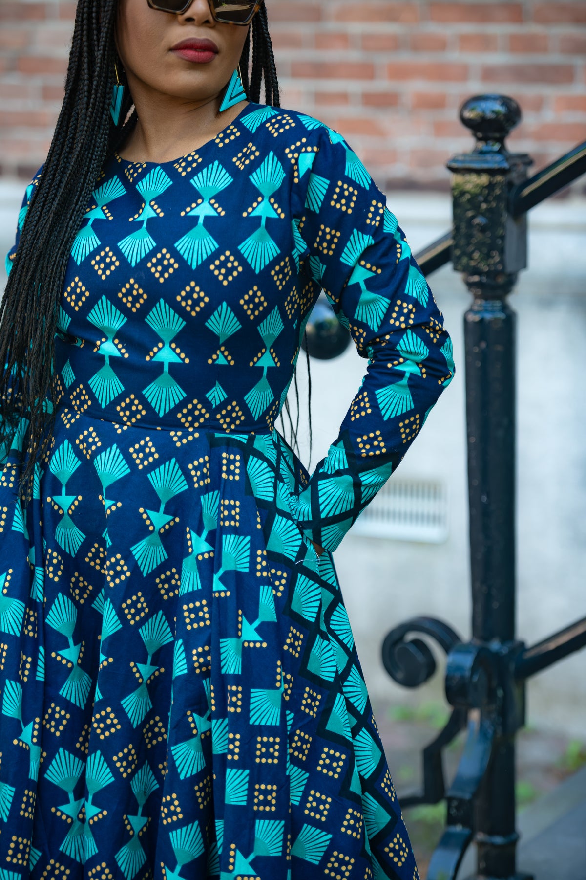 Close up view of the Blue and Brown African print Cotton Midaxi dress with Long Sleeves & A line Silhouette.