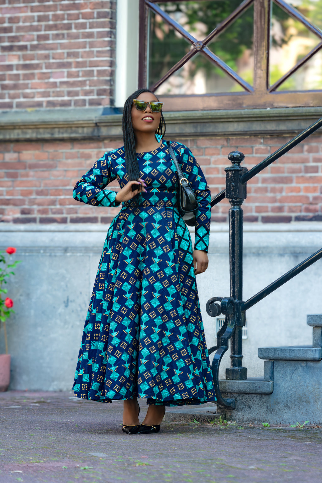 Front view of Blue and Brown African print Cotton Midaxi dress with Long Sleeves.