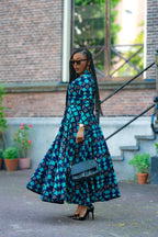 Side view of Blue and Brown African print Cotton Midaxi dress with Long Sleeves & A line Silhouette