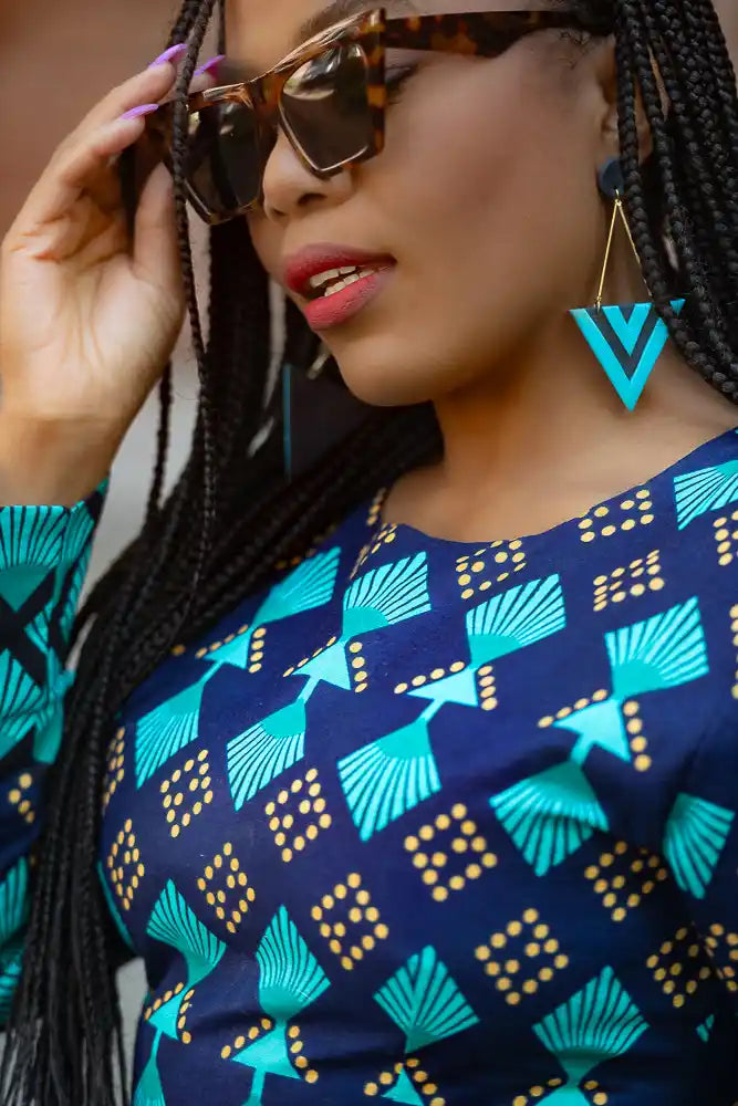 Moyo Blue drop earrings with a Geometric design styled by Model.
