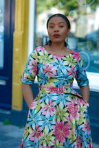 Close up detail of Floral Gold African print Maxi Cotton Dress with Fitted Silhouette & 3/4 Sleeves