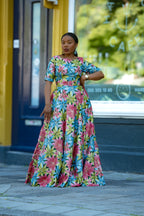 Front view of Floral Gold African print Maxi Cotton Dress with Fitted Silhouette & 3/4 Sleeves