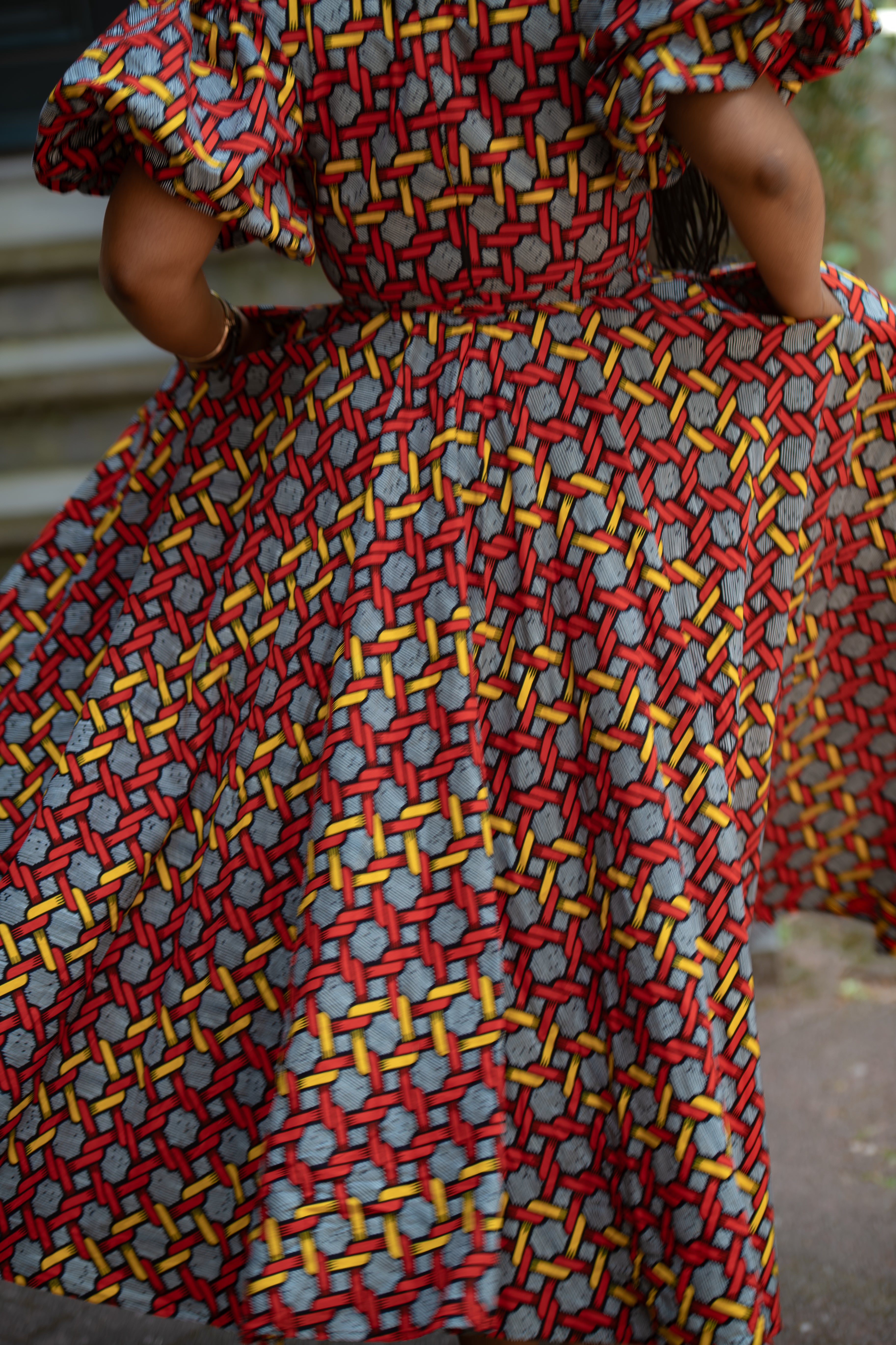 Close up of colourful Olori Woven African print Ankara Maxi Women's dress