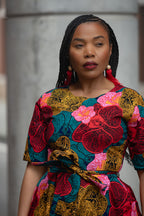 Close view of Model wearing a floral African print Ankara Midi Dress