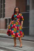 Model wearing a floral African print Ankara Midi Dress