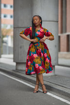 Model wearing a floral African print Ankara Midi Dress styled for an Occasion
