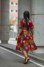 Model wearing a floral African print Ankara Midi Dress