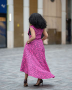 Back view of pink African print Ankara hi low Midi Dress