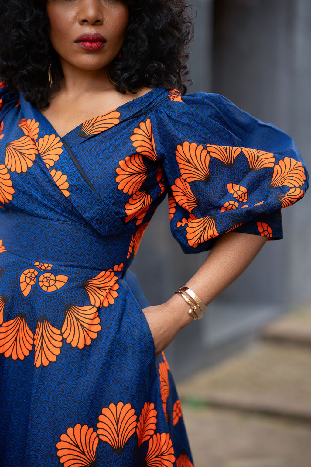 Puff sleeve detail on Blue & Orange Ankara Dress