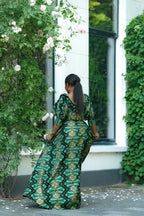 Back detail of Green and Gold African print Cotton Maxi Dress with puff sleeves.