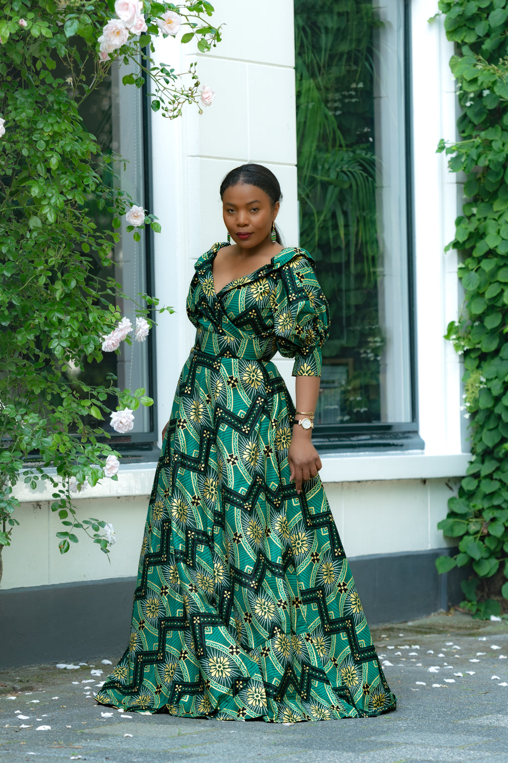 Side View Green and Gold African print Cotton Maxi Dress with puff sleeves.