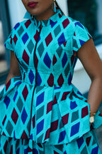 Close up detail of Blue African print Cotton Peplum Top with Front Zipper and matching Skirt.