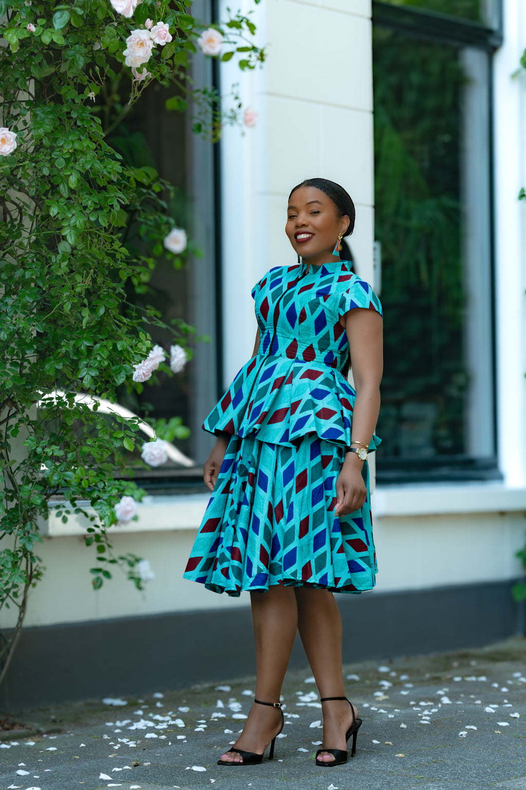Blue African print Cotton Peplum Top with Front Zipper and matching Skirt.
