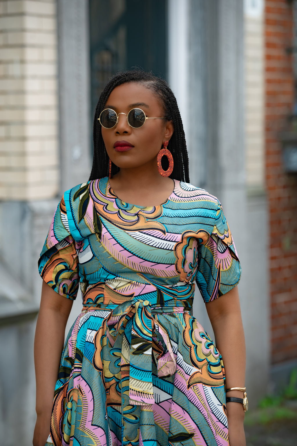 Close up detail ofMulticolour African print cotton Midi Dress with Matching Belt.