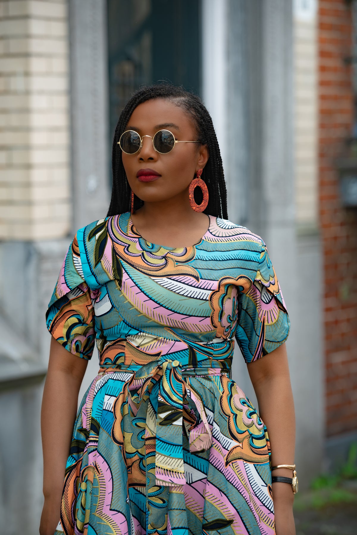 Close up detail ofMulticolour African print cotton Midi Dress with Matching Belt.