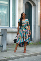 Multicolour African print cotton Midi Dress with Matching Belt styled by Model for an Ocassion.
