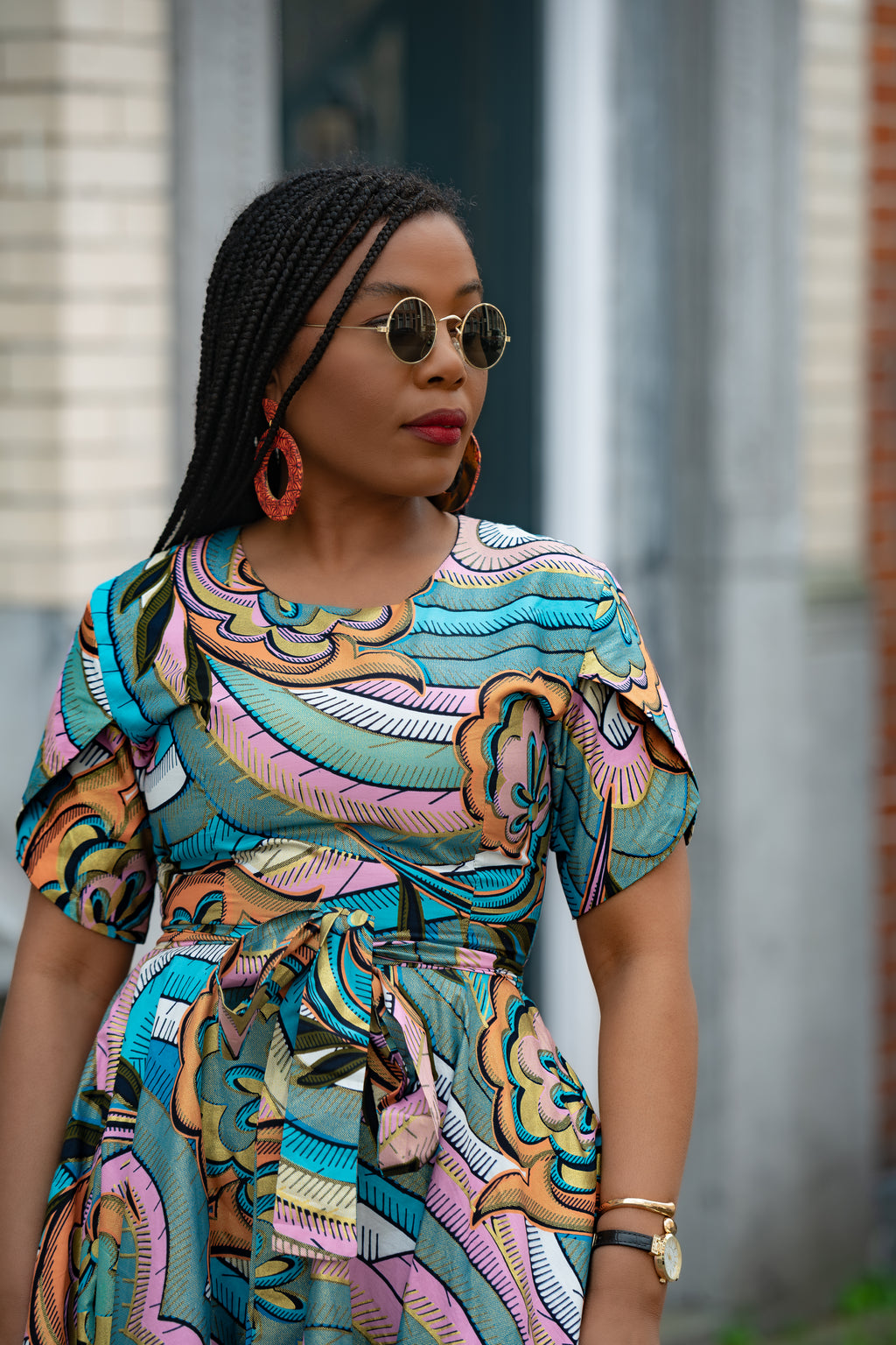 Close up view of Multicolour African print cotton Midi Dress with Matching Belt.