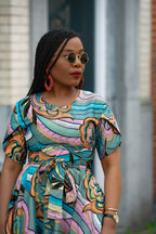 Close up view of Multicolour African print cotton Midi Dress with Matching Belt.