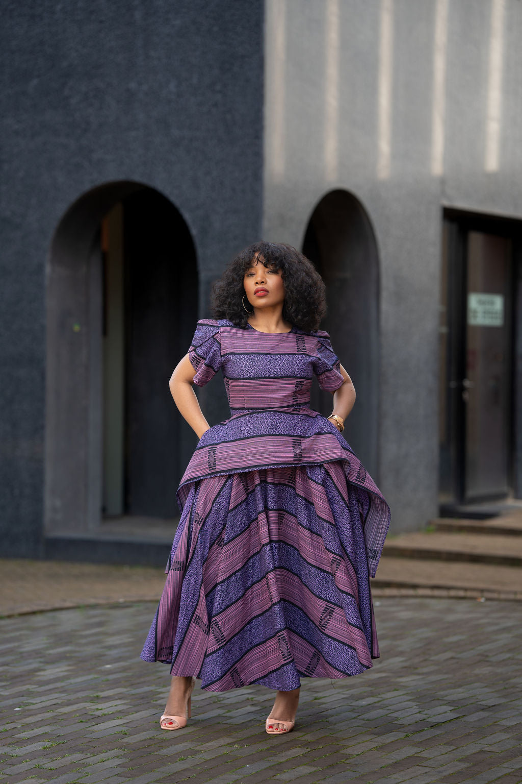 Purple African print Maxi dress styled for a special Occasion