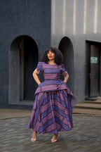 Purple African print Maxi dress styled for a special Occasion