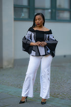 Model wearing African print Ankara cotton black and white flair top