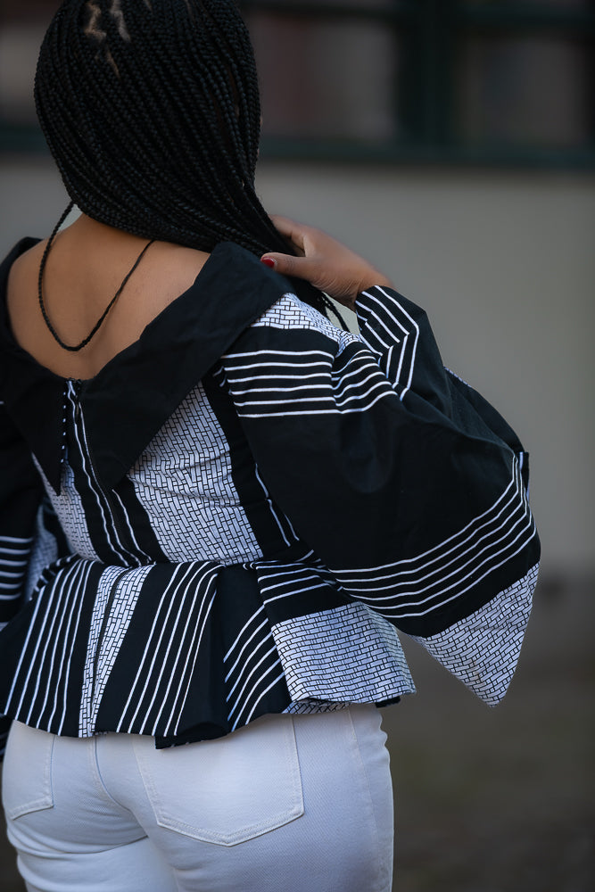Zinitha flair black and white top, Back detail of Ankara cotton African print occasion dress
