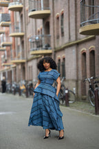 Model wearing an elegant African print wedding outfit