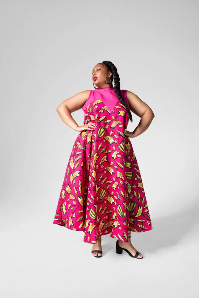 Abeba Pink Flare Dress, Front profile of luxury Ankara occasion dress in premium African cotton fabric