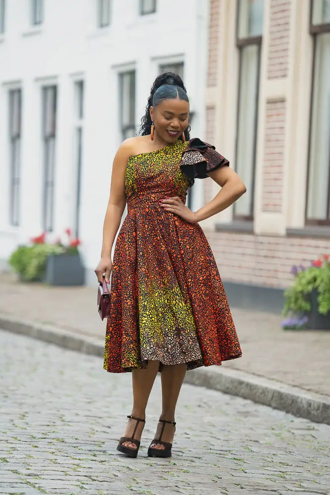 ADAEZE BROWN Women’s African print occasion dress crafted from premium Ankara cotton by Heritage Clothings.