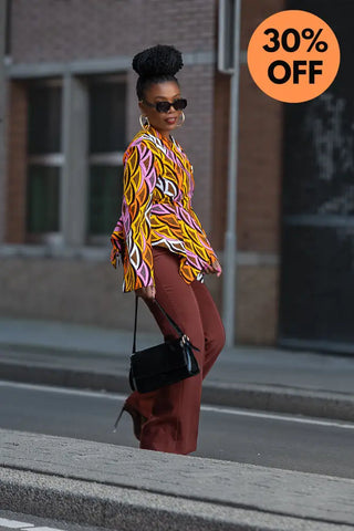 Amari Long Sleeve Peplum Top.