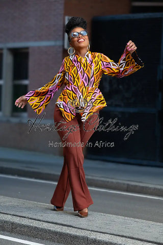 Amari Long Sleeve Peplum Top.